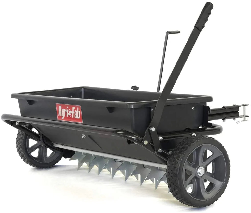 100 lb (approx. 45 kg) trailed lawn and garden spreader/seeder/fertilizer spreader for seeds, fertilizer, salt, road salt; designed to be pulled behind lawn and garden tractors