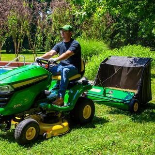 John Deere 42�� trailed lawn sweeper, 24 cubic foot capacity, adjustable brushes